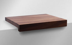 Walnut Edge Cutting Board with a raised back edge for the built-in magnetic knife holder